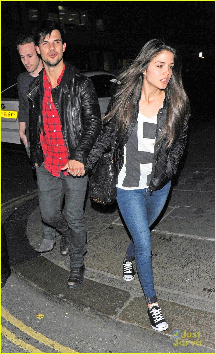 taylor lautner marie avgeropoulos matching jackets london 15